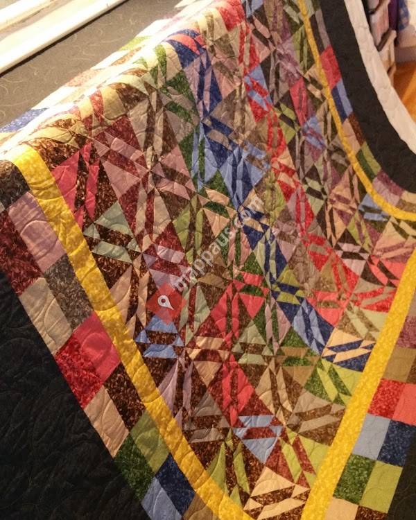 Darvanalee Designs Longarm Quilting Service & Singer sewing machines